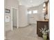 Bathroom view with glass block partition, granite countertop, vanity, tile floors and access to toilet area at 2150 Fincher Rd, Canton, GA 30114