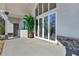 Front entrance featuring a neutral facade, outdoor storage, a potted palm and an oversized glass sliding door at 2150 Fincher Rd, Canton, GA 30114