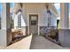 Home entrance featuring an elegant doorway with sidelight windows and stone accents at 2150 Fincher Rd, Canton, GA 30114