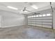 Spacious two-car garage with automatic door, and overhead lighting at 2150 Fincher Rd, Canton, GA 30114