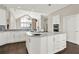 Bright kitchen with white cabinetry, a central island, and stainless steel appliances at 2150 Fincher Rd, Canton, GA 30114