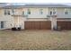 Townhome backyard featuring grass with a wooden privacy fence at 418 Lantern Wood Dr, Scottdale, GA 30079