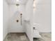 Walk-in shower with rainfall shower head, gold fixtures, and modern white vanity with shelving at 150 Melody Ln, Fayetteville, GA 30215