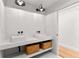 Modern bathroom with double sinks and storage at 150 Melody Ln, Fayetteville, GA 30215