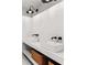 Stylish bathroom featuring double sinks, storage baskets, and modern lighting at 150 Melody Ln, Fayetteville, GA 30215
