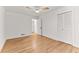 Light and airy bedroom with hardwood floors and a spacious closet at 150 Melody Ln, Fayetteville, GA 30215
