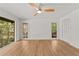 Empty bedroom with natural light and hardwood flooring at 150 Melody Ln, Fayetteville, GA 30215