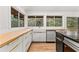 Modern kitchen featuring an island and butcher block countertops at 150 Melody Ln, Fayetteville, GA 30215
