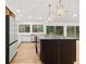 Bright kitchen featuring an island, butcher block countertops, and stainless steel appliances at 150 Melody Ln, Fayetteville, GA 30215