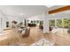 Spacious living room and dining room; view of the kitchen with hardwood floors at 150 Melody Ln, Fayetteville, GA 30215