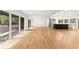 Large living room featuring a fireplace, hardwood floors, and natural light at 150 Melody Ln, Fayetteville, GA 30215