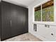 Custom storage and natural light complete the design at 150 Melody Ln, Fayetteville, GA 30215