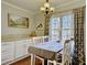 Charming dining room features a large window offering ample natural light at 1938 Kelvin Dr, Lawrenceville, GA 30043