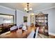 Formal dining room features classic wood furniture and elegant decor at 1938 Kelvin Dr, Lawrenceville, GA 30043