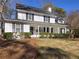 Charming two-story home with a welcoming front porch and well-maintained landscaping at 1938 Kelvin Dr, Lawrenceville, GA 30043