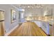 Well-lit kitchen with white cabinets, butcher block island, and stainless steel appliances at 1938 Kelvin Drive Dr, Lawrenceville, GA 30043