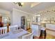 Modern kitchen boasts an eat-in area, butcher block island, and stainless appliances at 1938 Kelvin Dr, Lawrenceville, GA 30043