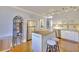 Updated kitchen features stainless appliances, white cabinets, and butcher block island at 1938 Kelvin Dr, Lawrenceville, GA 30043