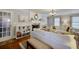 Bright living room features a fireplace, built-in shelving, and ample seating at 1938 Kelvin Dr, Lawrenceville, GA 30043