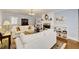 Cozy living room includes a fireplace, built-in shelving, and a plush sofa at 1938 Kelvin Dr, Lawrenceville, GA 30043