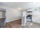 Bright, modern kitchen with stainless steel appliances and bar seating area at 238 Howell Sw Dr, Atlanta, GA 30331