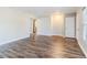 Inviting living room featuring laminate flooring, neutral colors, and great flow at 238 Howell Sw Dr, Atlanta, GA 30331