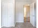 Bedroom with double doors leading into the hall at 2631 Santa Barbara Nw Dr, Atlanta, GA 30318