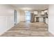 Open layout featuring a modern kitchen with stainless steel appliances, connected to a well-lit and comfortable living area at 2631 Santa Barbara Nw Dr, Atlanta, GA 30318
