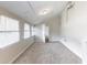 Sunroom with three large windows offering plenty of natural light at 2631 Santa Barbara Nw Dr, Atlanta, GA 30318