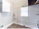 Utility Room with wood-look flooring, and neutral walls at 2631 Santa Barbara Nw Dr, Atlanta, GA 30318