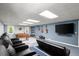 Recreational basement featuring a foosball table, guitars, and comfortable theater seating at 275 Waverly W Trce, Roswell, GA 30075