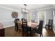 Spacious dining room with a large wooden table and stylish decor at 275 Waverly W Trce, Roswell, GA 30075
