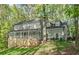 Charming two-story home with a welcoming front porch and a well-manicured lawn at 275 Waverly W Trce, Roswell, GA 30075