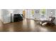 Inviting living room featuring hardwood floors, a piano and plenty of natural light at 275 Waverly W Trce, Roswell, GA 30075