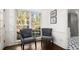 Cozy sitting area with large windows and comfortable chairs at 275 Waverly W Trce, Roswell, GA 30075