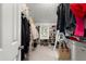 Spacious walk-in closet with built-in shelving and storage for an organized wardrobe at 275 Waverly W Trce, Roswell, GA 30075