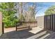 Wooden deck is perfect for entertaining or relaxing in the backyard at 312 River Glen Dr, Roswell, GA 30075