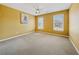 Bedroom with ample natural light and a ceiling fan, perfect for a comfortable and inviting space at 1043 Sugar Pike Way, Canton, GA 30115