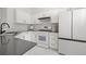 Modern kitchen with stainless steel appliances, sleek countertops, and ample cabinet space at 112 Timber Mist Ln, Lawrenceville, GA 30045