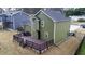 Two-story home with a spacious deck, offering ample outdoor living space with lots of room to entertain at 2102 Bedford Ct, Lithonia, GA 30058