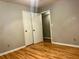 Bedroom with hardwood floors and a closet at 2102 Bedford Ct, Lithonia, GA 30058