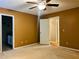 Bedroom with ensuite bathroom, window and carpet at 2102 Bedford Ct, Lithonia, GA 30058