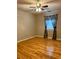 Bedroom with hardwood floors, ceiling fan and natural light at 2102 Bedford Ct, Lithonia, GA 30058