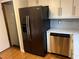 Modern kitchen featuring a stainless steel refrigerator and stainless steel dishwasher at 2102 Bedford Ct, Lithonia, GA 30058