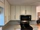 Kitchen featuring white cabinets, granite countertops, and stainless steel appliances at 2102 Bedford Ct, Lithonia, GA 30058