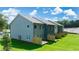 Aerial view of townhomes with green lawns, fenced-in patios, and well-maintained landscaping at 344 Sinclair Ct # 74, Mcdonough, GA 30253