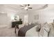 Spacious main bedroom featuring tray ceilings, carpet floors, sitting area and modern decor at 344 Sinclair Ct # 74, Mcdonough, GA 30253