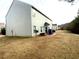 Large backyard featuring a patio and plenty of space for outdoor activities at 1291 Vienna Ct, Hampton, GA 30228