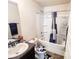 Bathroom equipped with a vanity, toilet, and shower/tub combo, ensuring essential facilities in a compact and functional arrangement at 1291 Vienna Ct, Hampton, GA 30228