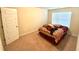 Bedroom with carpet floors and window at 1291 Vienna Ct, Hampton, GA 30228